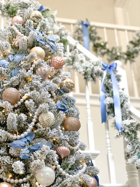 Pastel, Poinsettias & Pearls, Oh my! A very grandmillennial  Christmas is on the way! Pastel Christmas, King of Christmas, Flocked Tree, holiday decor, preppy Christmas, feminine, chic, glam, blue & blue, blue & white, flocked garland, stair garland

#LTKSeasonal #LTKHoliday #LTKhome