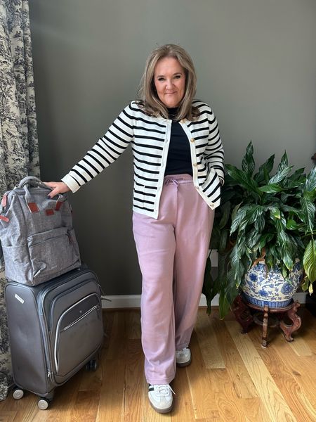 Travel pants. These are similar to the Lulu but 1/4 of the price. The large fit but I ordered a looser  fit of the XL. I’m wearing the 27” inseam. Also come in a 29"

Cardigan perfect for travel day and throughout your trip especially in the cooler locals like the UK or Northern Europe. Size large  

#LTKTravel #LTKFindsUnder100 #LTKOver40