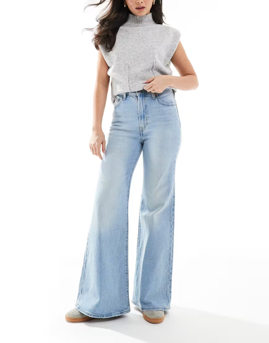 Levi's ribcage bells high rise flare jeans in blue wash | ASOS (Global)