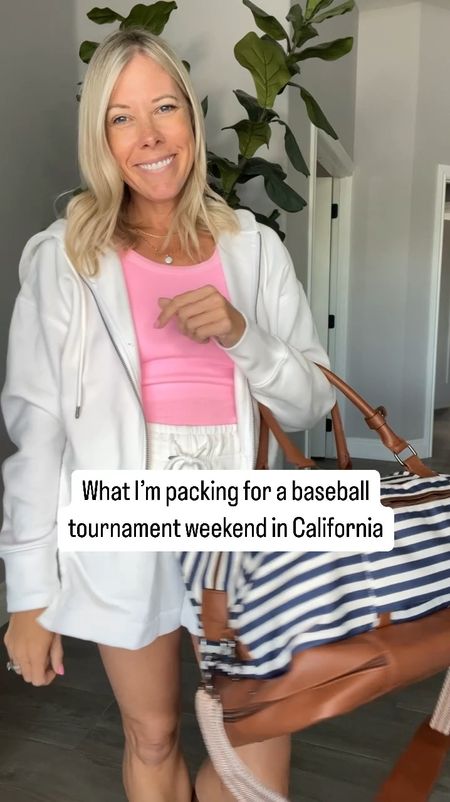 Sports mom travel outfit baseball mom tournament weekend in California 

White lounge set: size small in both pieces
Pink tank: runs small size medium
Rainbow sweatshirt: I sized up to a medium
Jean shorts size 26
Blue wide leg pants size small
White leggings and grey all sweatshirt size small
Sandals all true to size 

#LTKstyletip #LTKtravel #LTKSeasonal
