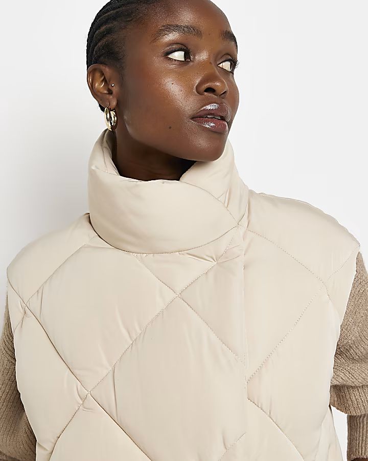 Cream quilted high neck gilet | River Island (UK & IE)