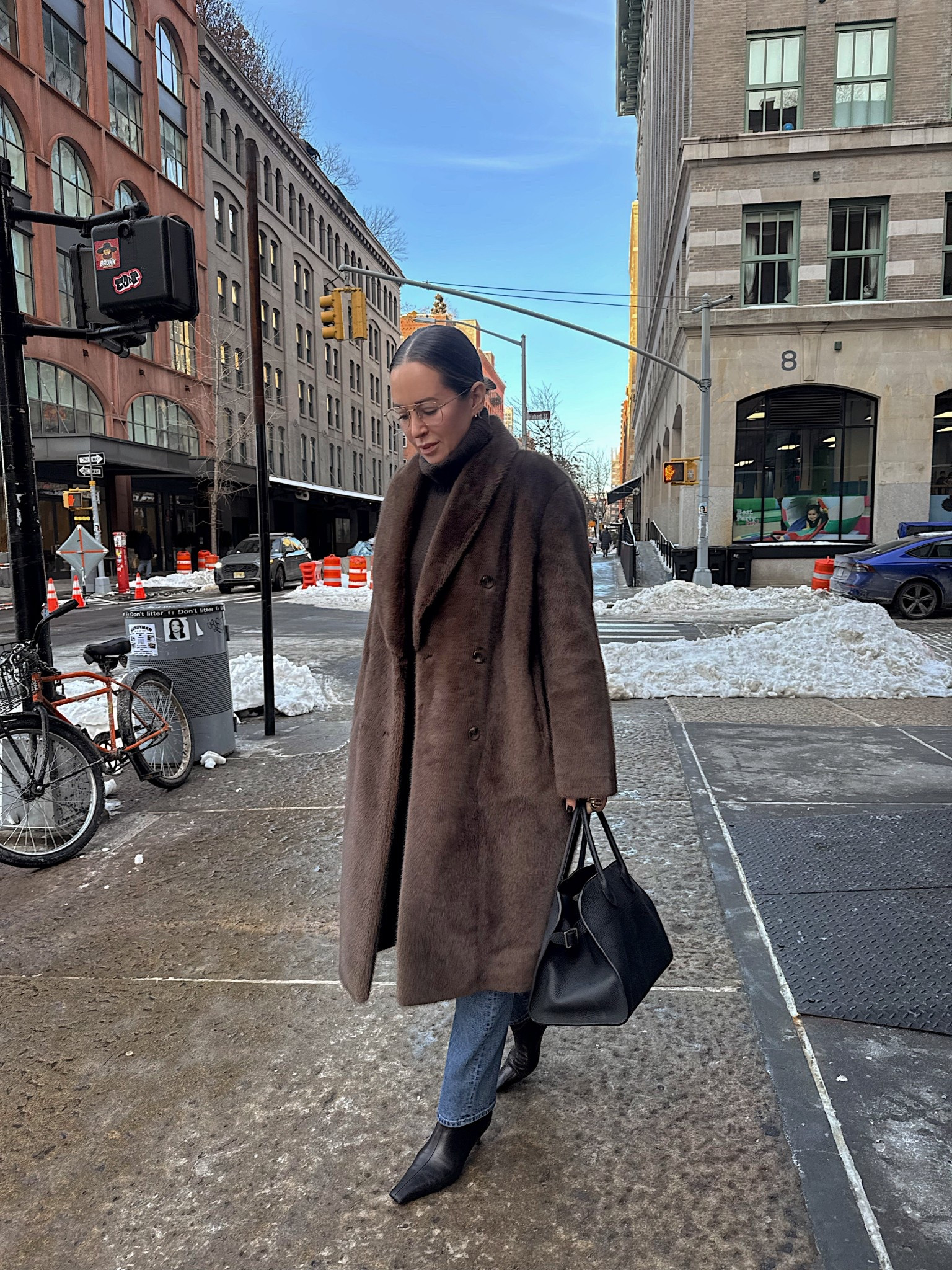 Denim runs TTS. Wearing a M in the sweater. 