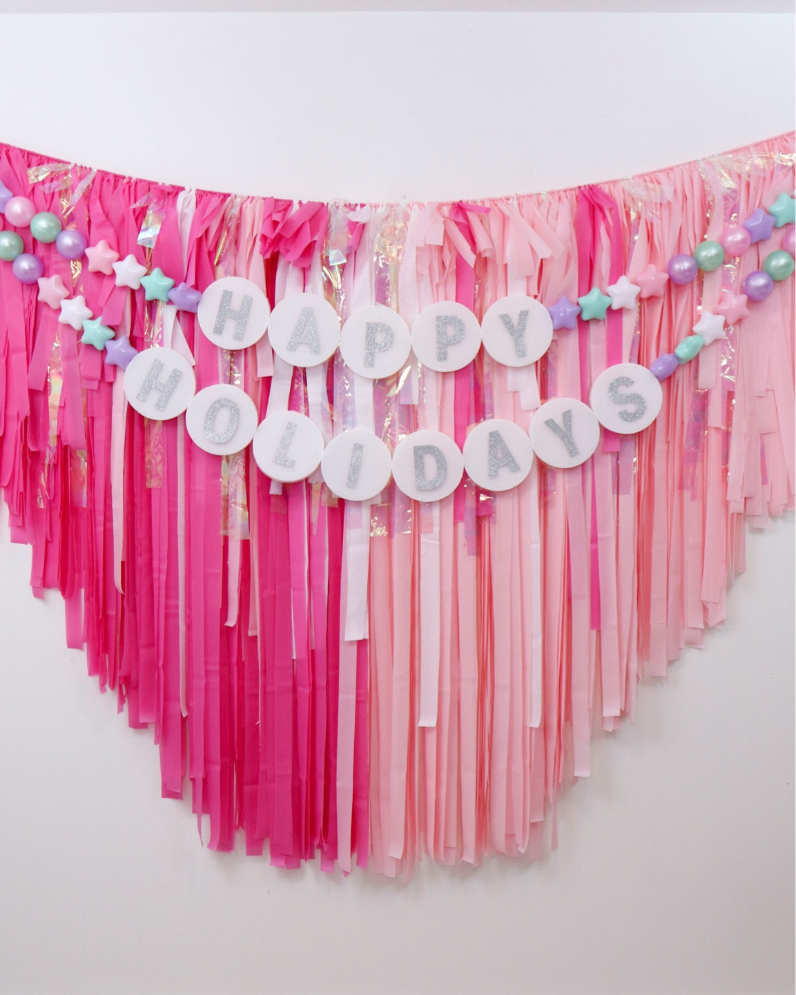 Jumbo DIY Friendship Bracelet Holiday Garland! Enter the Christmas ERA! Perfect for Taylor Swift fans! 
Get the full DIY on my Instagram.
#diyfriendshipbracelet #taylorswiftdecor #holidaytaylorswift #swifties #christmasgarland

#LTKkids #LTKHoliday #LTKSeasonal