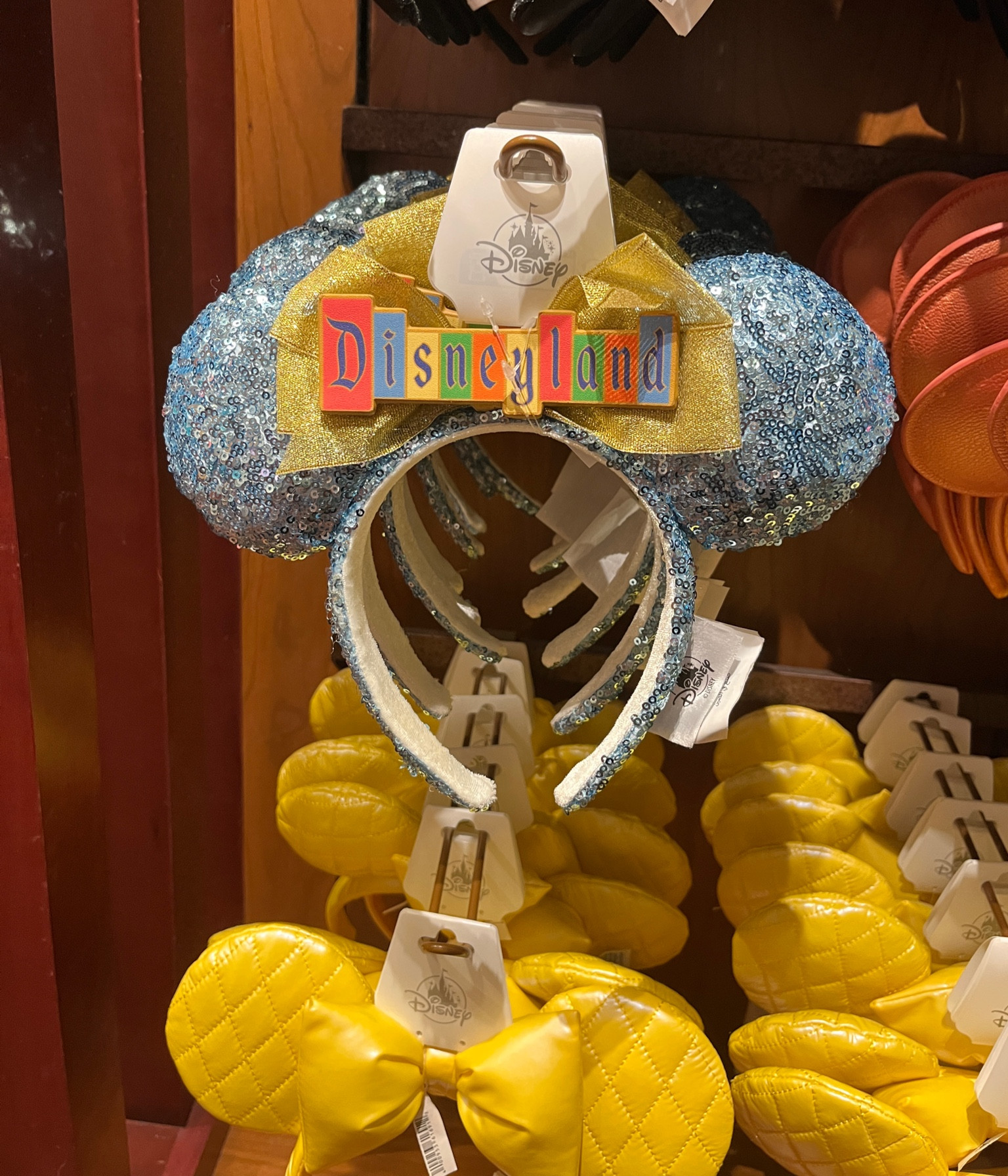 I love these Minnie Mouse ears with the park marquee - they have both Disneyland and Disney World!  I love the light blue sequins and gold bow!

Disney ears headband 

#LTKSaleAlert #LTKFindsUnder50