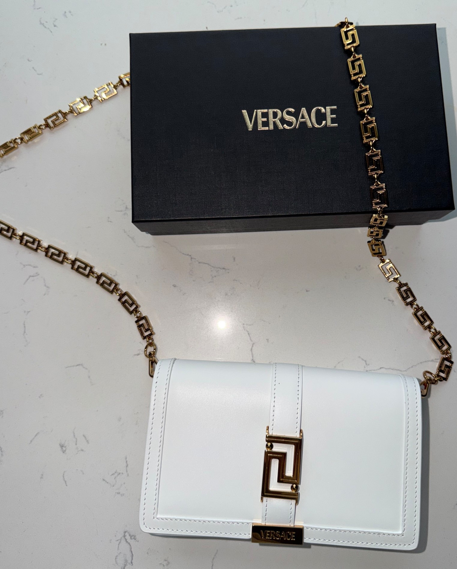 VERSACE GRECA GODDESS MINI BAG
Perfect little white bag for spring, summer, and travel! Crossbody, shoulder bag, and a clutch all in one. Fits my IPhone 17 pro max pertectly.


#LTKootd #LTKSaleAlert #LTKU
