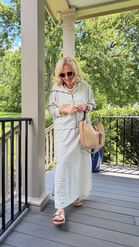 Tap the bell 🔔, heart ❤️ this post, and save for later!

This striped hoodie maxi dress is the definition of easy style. Soft, comfortable, and perfect for everyday wear, it's the kind of throw-on-and-go piece you'll reach for all season. Paired with comfortable sandals and a woven tote for an effortless casual look.

Fit note: I'm wearing a medium on both the top and the skirt.

#LTKootd #LTKOver40 #LTKdayinmylife