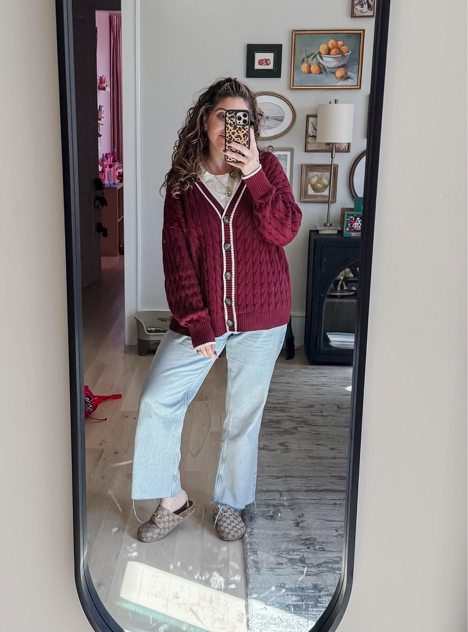 I call this outfit, Fall grandma! This cable cardigan from Old Navy is so cozy and perfectly oversized! I’m also loving the burgundy color which is also really trending right now! Jeans are new from Zara and the perfect in between of a wide leg and straight leg! Slides are sold out but will link anyway for you to keep an eye out for them with a restock from Talulah! 
Cardigan L / White tee L / Jeans 12 tts / Slides tts 

#LTKSeasonal #LTKMidsize #LTKootd