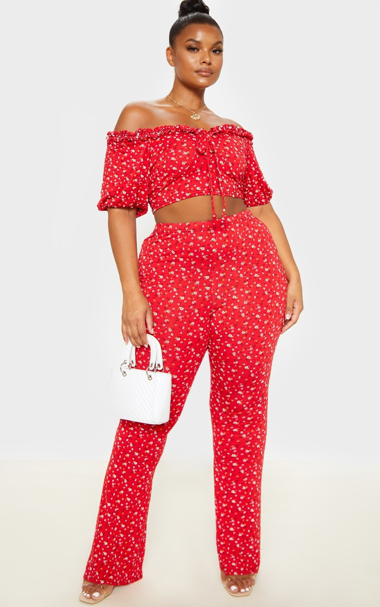 Plus Red Ditsy Floral Flared Pants | PrettyLittleThing US