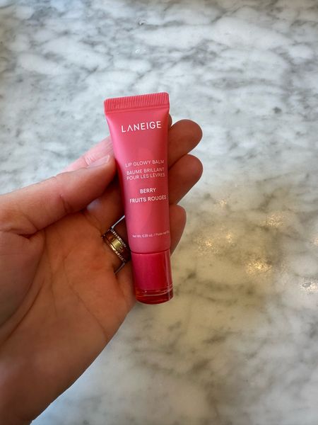Laneige lip glowy balm in color berry. Such a light tint on the color and not sticky! ❤️ 

#LTKFindsUnder50 #LTKBeauty