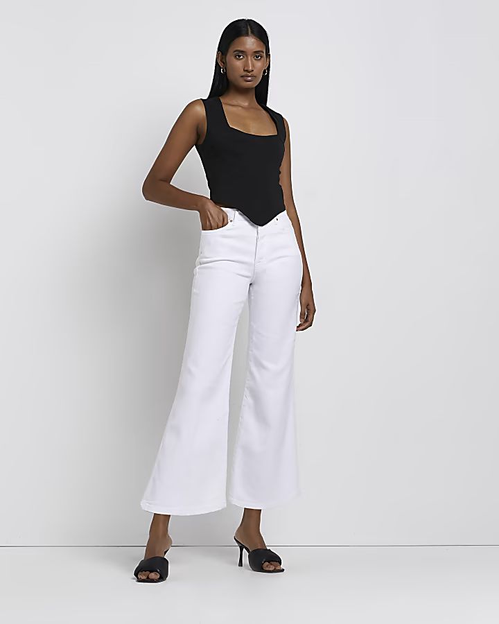 White cropped high waisted flared jeans | River Island (UK & IE)