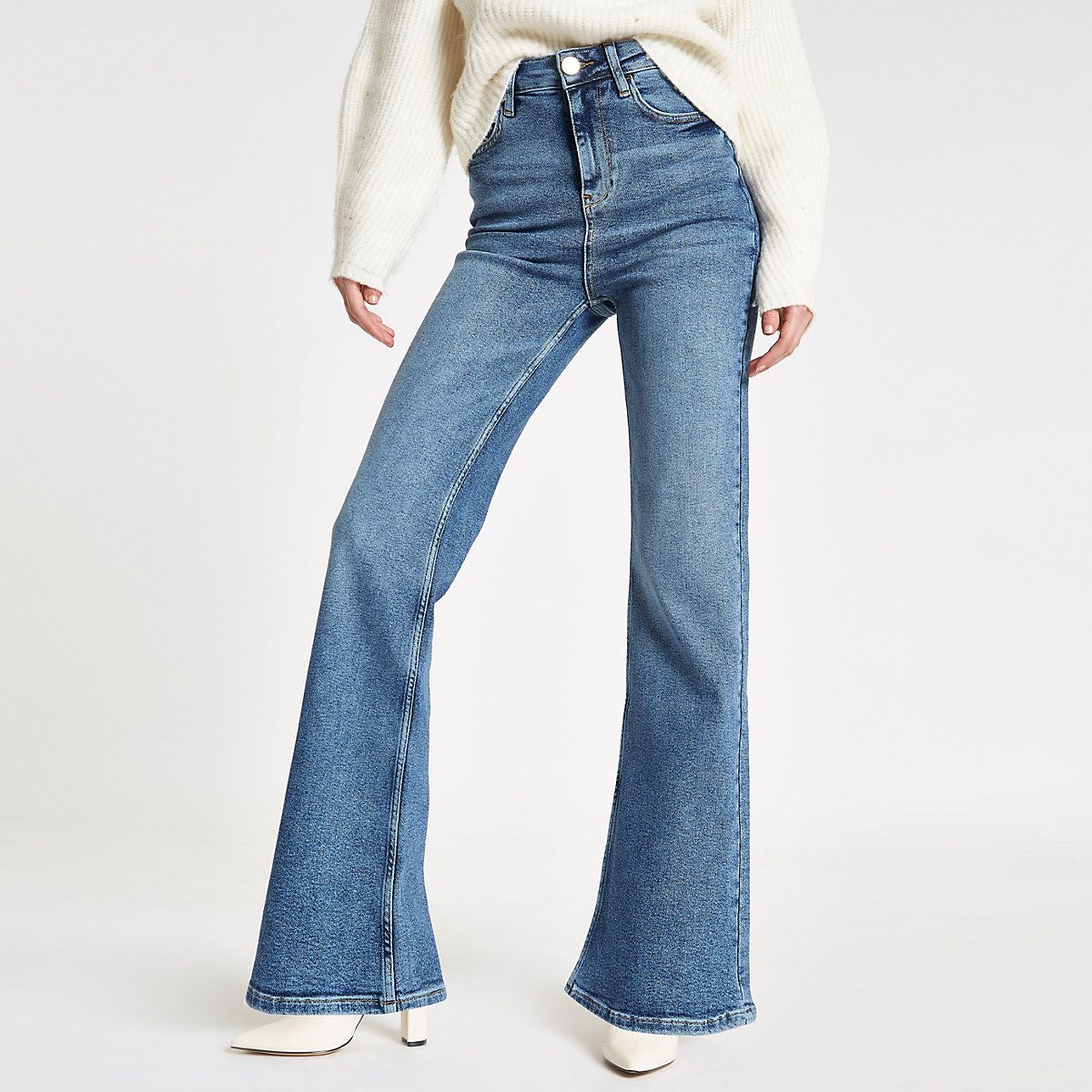 Mid blue denim RI flared jeans | River Island (UK & IE)