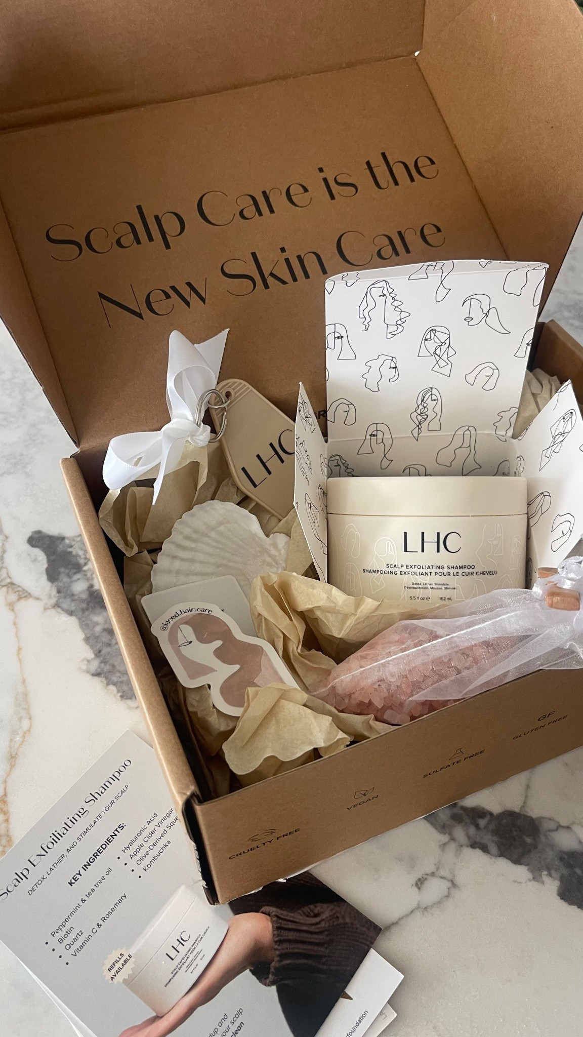 Laced Hair Scalp Exfoliating Shampoo 
Use code: WILDONE10 

#LTKBeauty