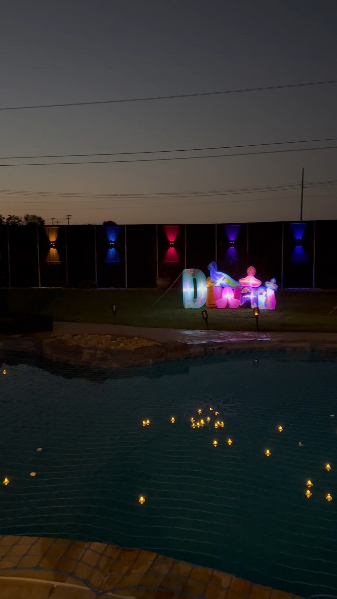 Fence lights, floating tea lights are exact

Diwali inflatables. The exact products are where I bought them from but seem to be out of stock now. I have linked a couple of similar ones. There is also a Canadian retailer that sells them https://www.idiya.ca/products/diya