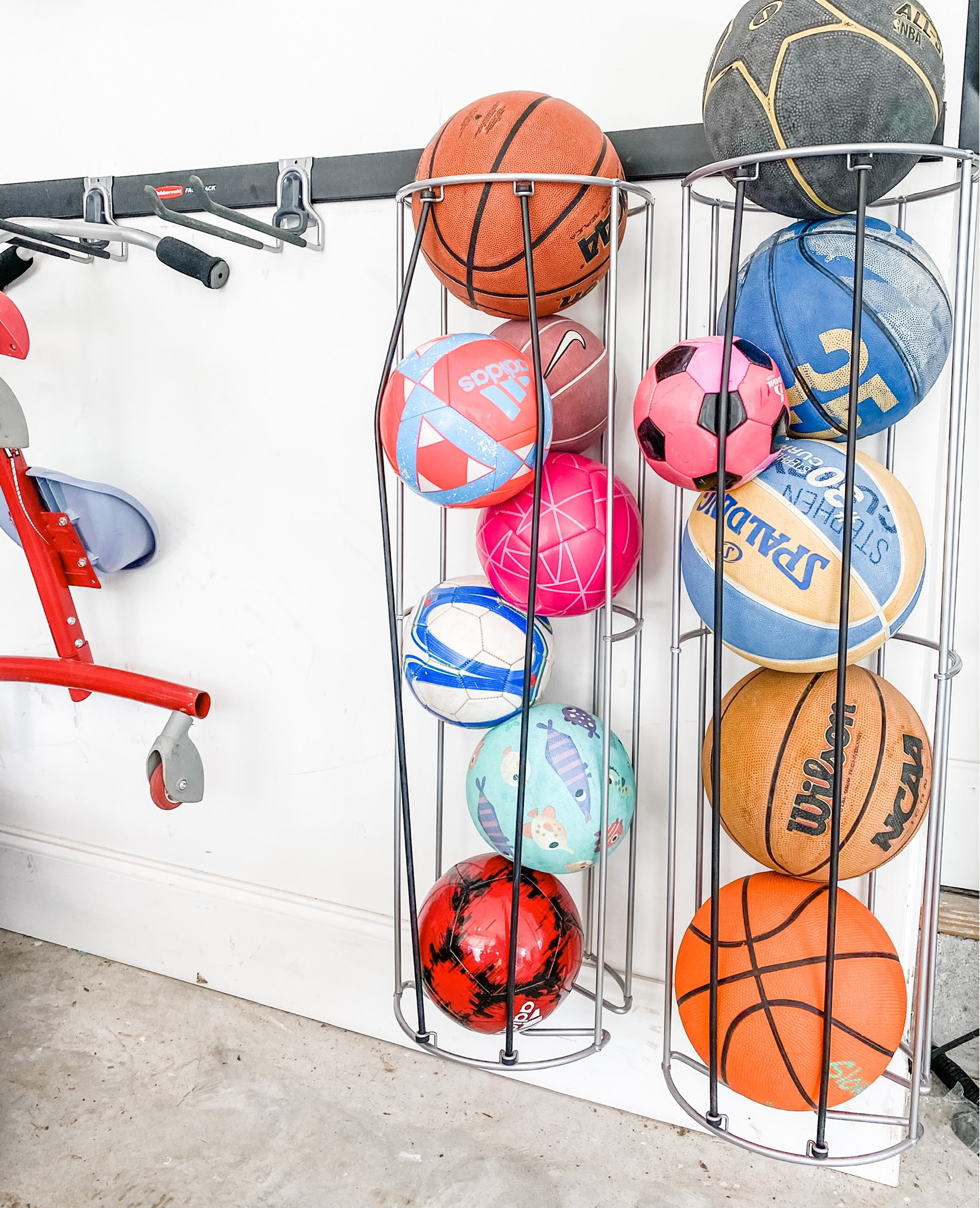 🏀⚽️🏐Basketballs, soccer balls, volleyballs anyone? These vertical storage ball racks are great for stacking all the sports balls in your garage! The bungee cords hold the balls in place plus allow for easy access!

#LTKfamily #LTKBacktoSchool #LTKkids