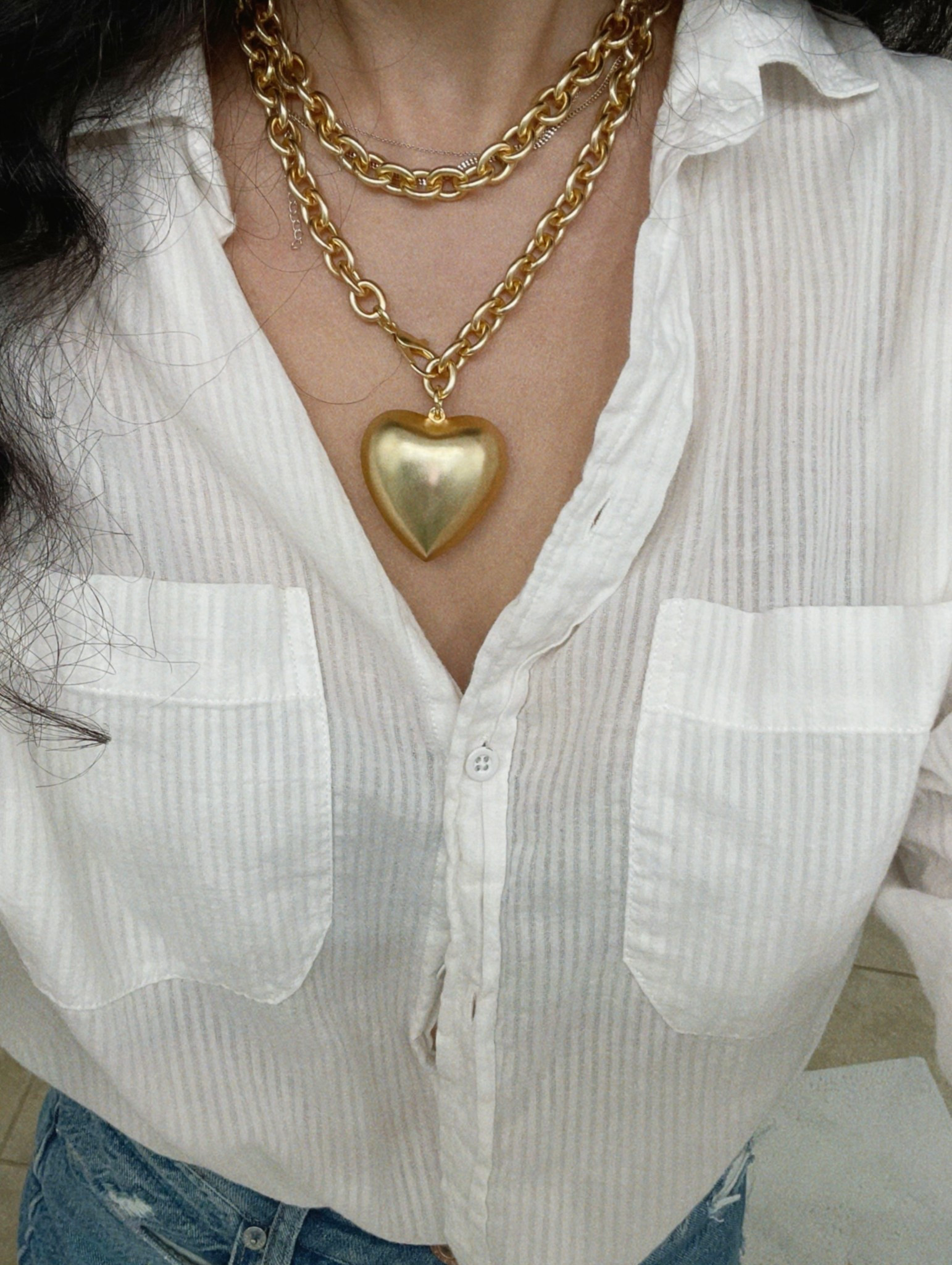 Obsessed with this puffy heart gold necklace - such a fun versatile piece!

Jewelry , fall style 
