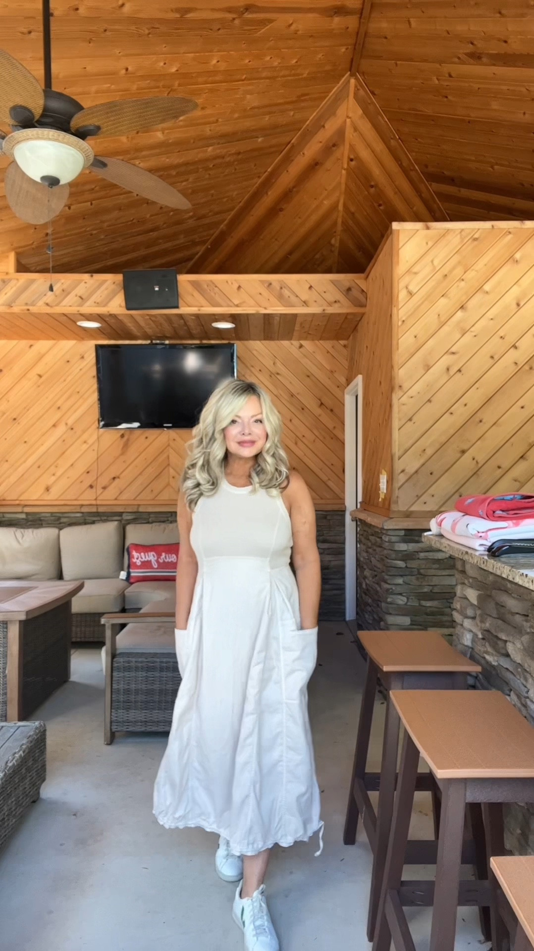 My new favorite summer dress with pockets! #summer #dress #halterdress #anthropologie 

#LTKOver40 #LTKSummerSales #LTKVideo