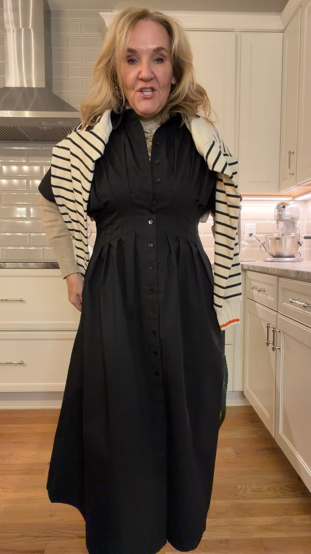 The top rated Anthropologie Toby dress in black. A classic dress that can be styled and worn all four seasons.
A medium petite fits me best with a little bit of extra room in the waist. I can also wear a small regular if petites are gone  If you want, it really fitted then size down. I can also wear the regular size just def size down  
Add a button down blouse or a turtleneck underneath for a work or holiday look. Both blouses are size medium.
Add a turtleneck or a fun graphic sweatshirt over your shoulders to dress it down

#LTKPetite #LTKOver40 #LTKSaleAlert