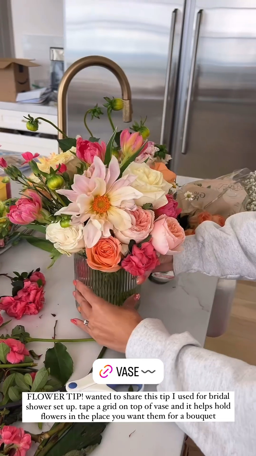 Flower tip! 🌺 tape a grid to the top of your vase to help arrange your flowers & hold them in place.  Got these little vases for under $10 and they worked perfect for our flower arrangements at a bridal shower 🫶🏼

Bridal shower decor, bridal shower flowers, flower vase, hosting tip, hostess, party decor, Walmart find, Amazon home, bridal flowers, wedding decor, summer party decor, Mother’s Day brunch decor, Christine Andrew 

#LTKVideo #LTKFindsUnder50 #LTKWedding