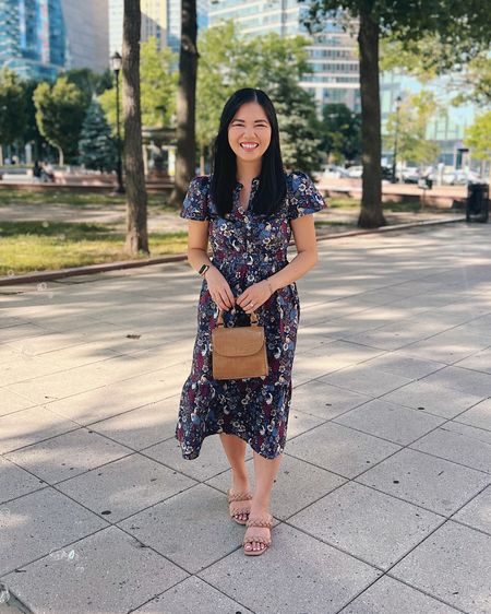 Navy floral dress (XSP)
Navy dress
Summer work dress
Brown leather bag
Small brown bag
Braided sandals (TTS)
Summer work outfit
Smart casual outfit
Teacher outfit
Mom outfit
LOFT outfit
Petite dress

#LTKSeasonal #LTKworkwear #LTKstyletip