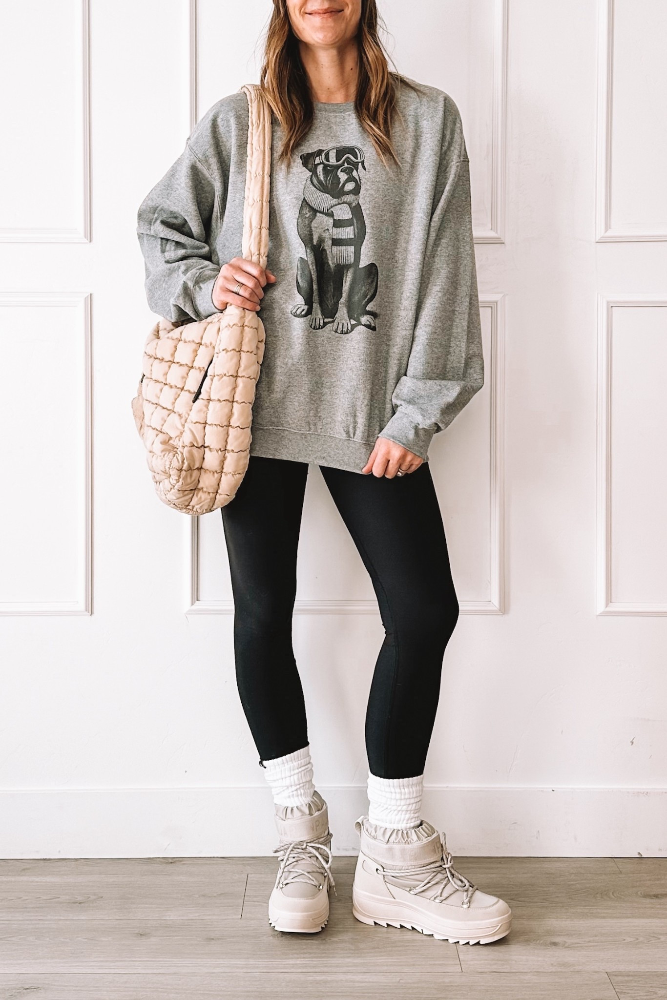 Cozy winter uniform 🤍 oversized graphic sweatshirt + black leggings + warm boots = easy, everyday mom style. This is my go-to for errands, school drop-off, and staying comfy without feeling sloppy.

#LTKmomlife #LTKootd #LTKgrwm