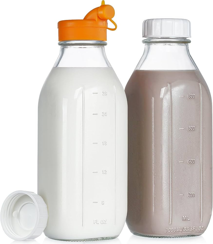 32 oz Reusable Glass Milk Bottles with Silicone Dispenser Cap, 2 Pack Glass Jars with Airtight Sc... | Amazon (US)