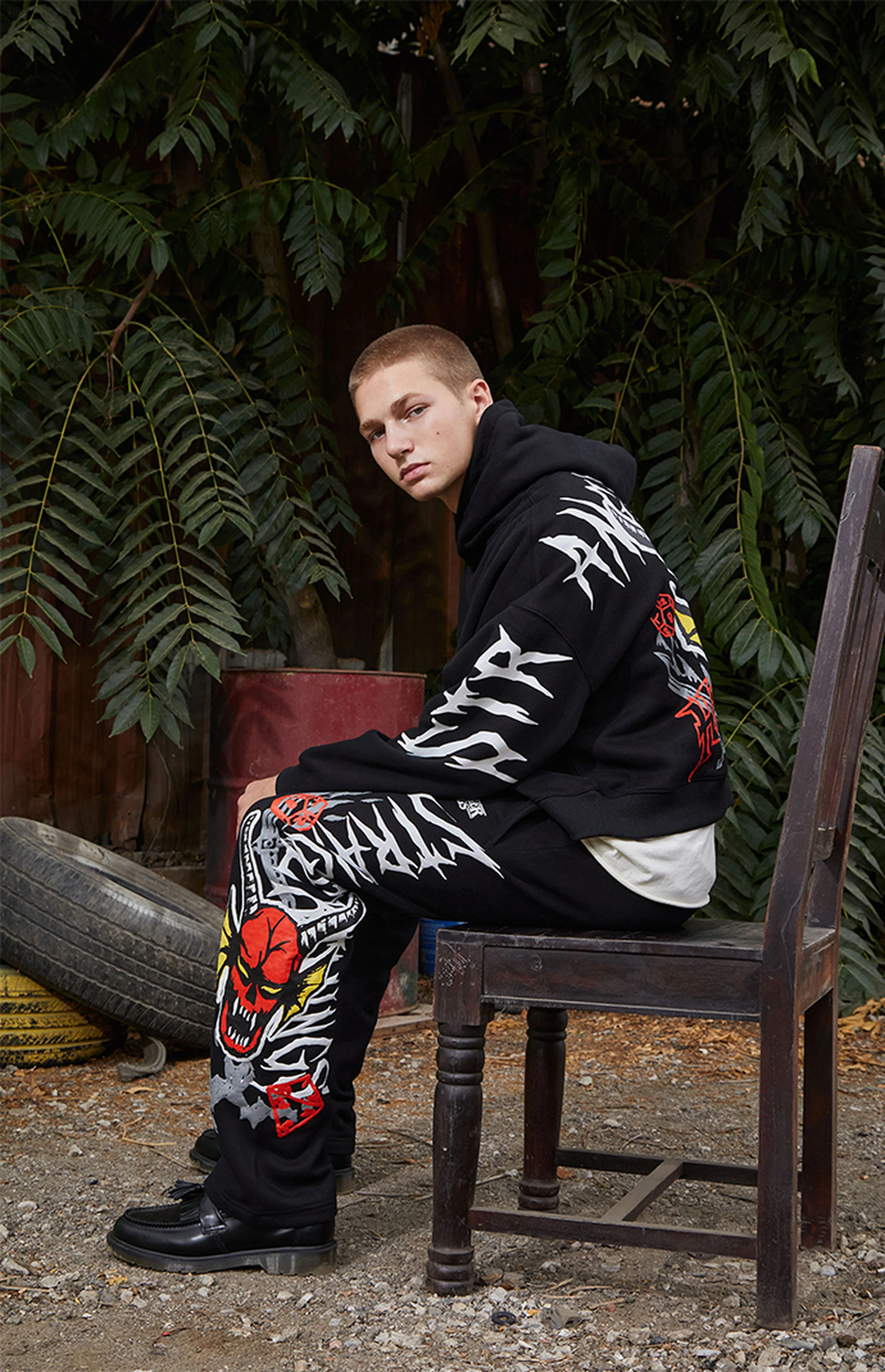 Netflix x Stranger Things Black Hellfire Club Baggy Sweatpants | PacSun