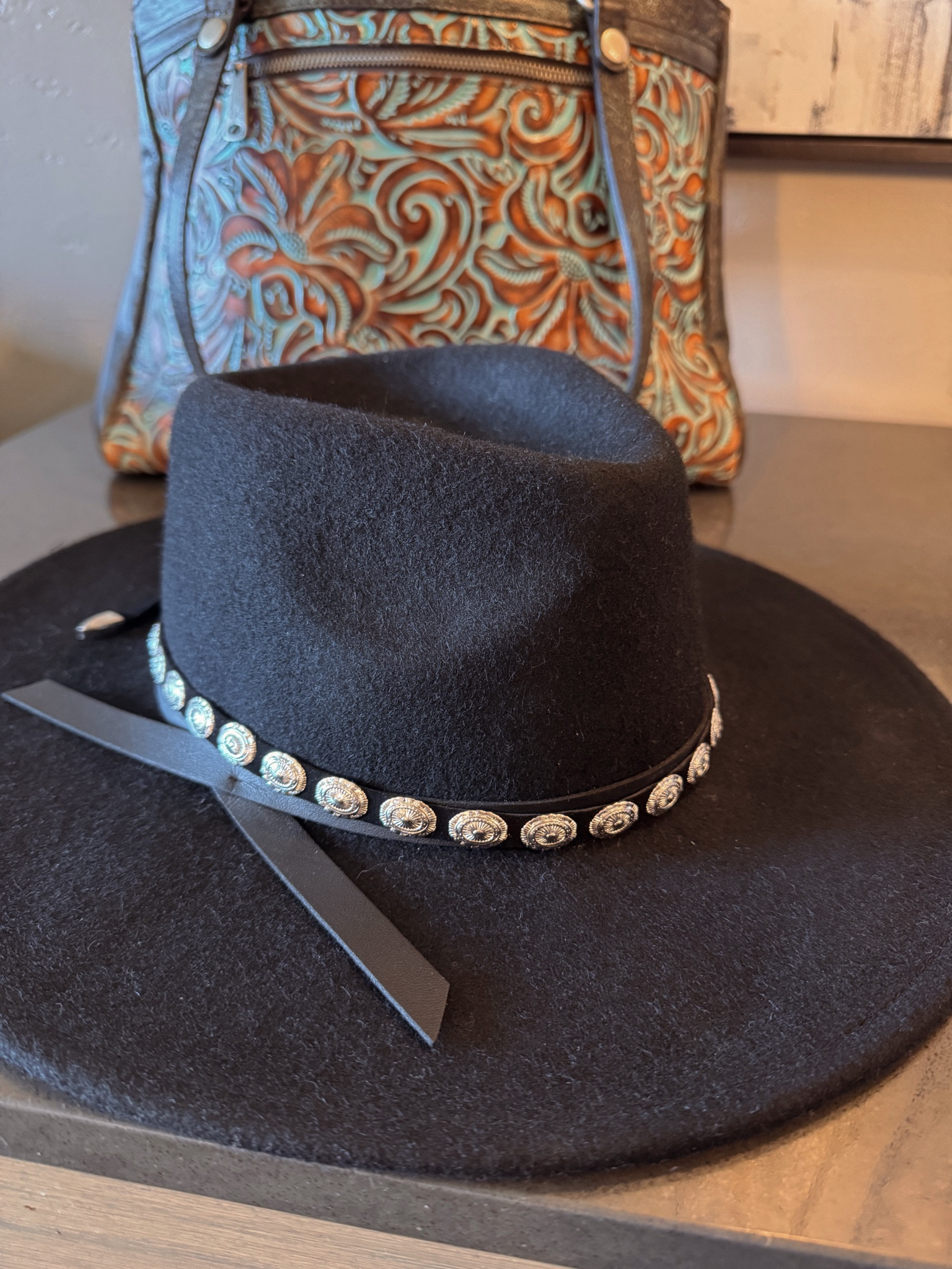Western accessories: new Concho Embellished Leather Hat Band to add onto my hat  
#westernstyle #steamboatsprings #colorado #westernpurse 
Country Concert Outfit

#LTKTravel #LTKSeasonal #LTKStyleTip
