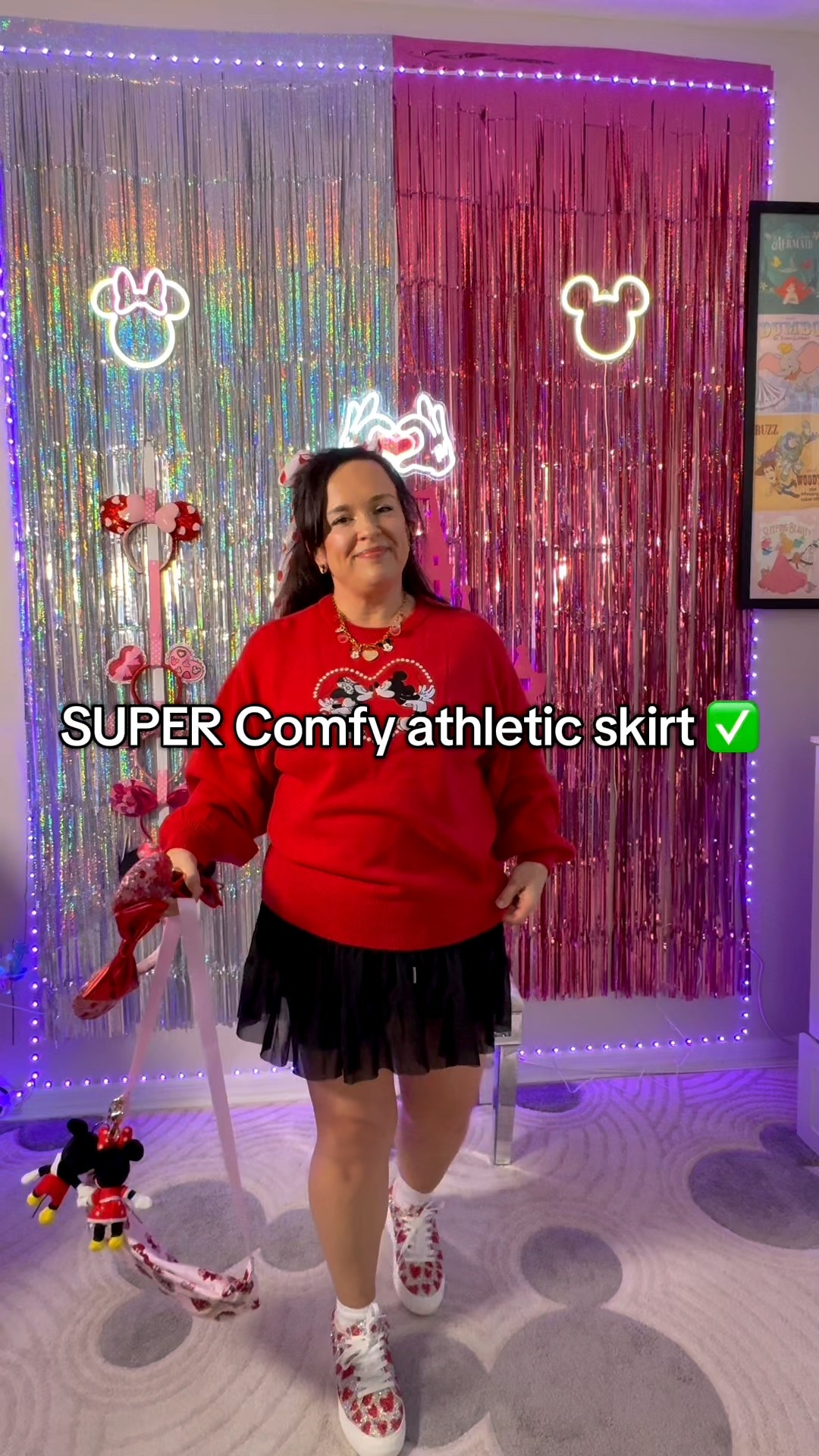 Florida temps understood the assignment. 🌡️❤️👏🏻
.
❤️Loving this cute sweater from @Her Universe 
❤️Comfy Athletic skirt from @Amazon Fashion 
❤️Adorable Charm Neclace from @thedarlingscreations 
❤️Sweetest Valentine Fanny Pack from @Stoney Clover Lane 
❤️SUPER Comfy Heart Bling shoes from @Betsey Johnson 
❤️Sweetest Minnie Ears from @Disney Store 
❤️Heart Sunglasses & Heart Hairbow from @target 
.
.
#disneyoutfits #valentinesdayoutfit #disneyparks #disneymom #outfitinspo 