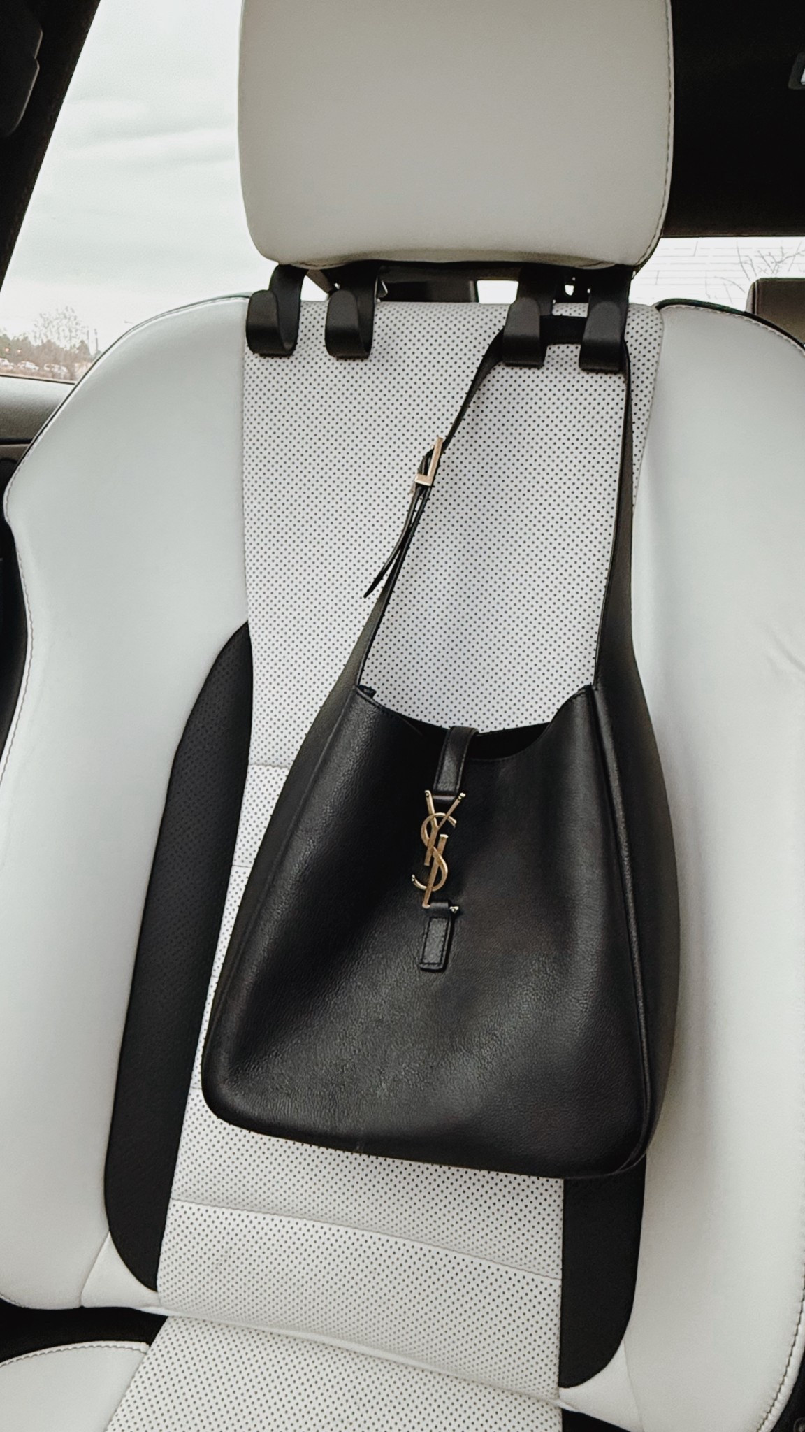 An underrated car essential ✨ No more purse on the floor or falling over every turn. These car hooks from Target are a MUST cute, practical, and only come in a pack of 2 💁‍♀️🖤

#LTKTravel #LTKGiftGuide #LTKU