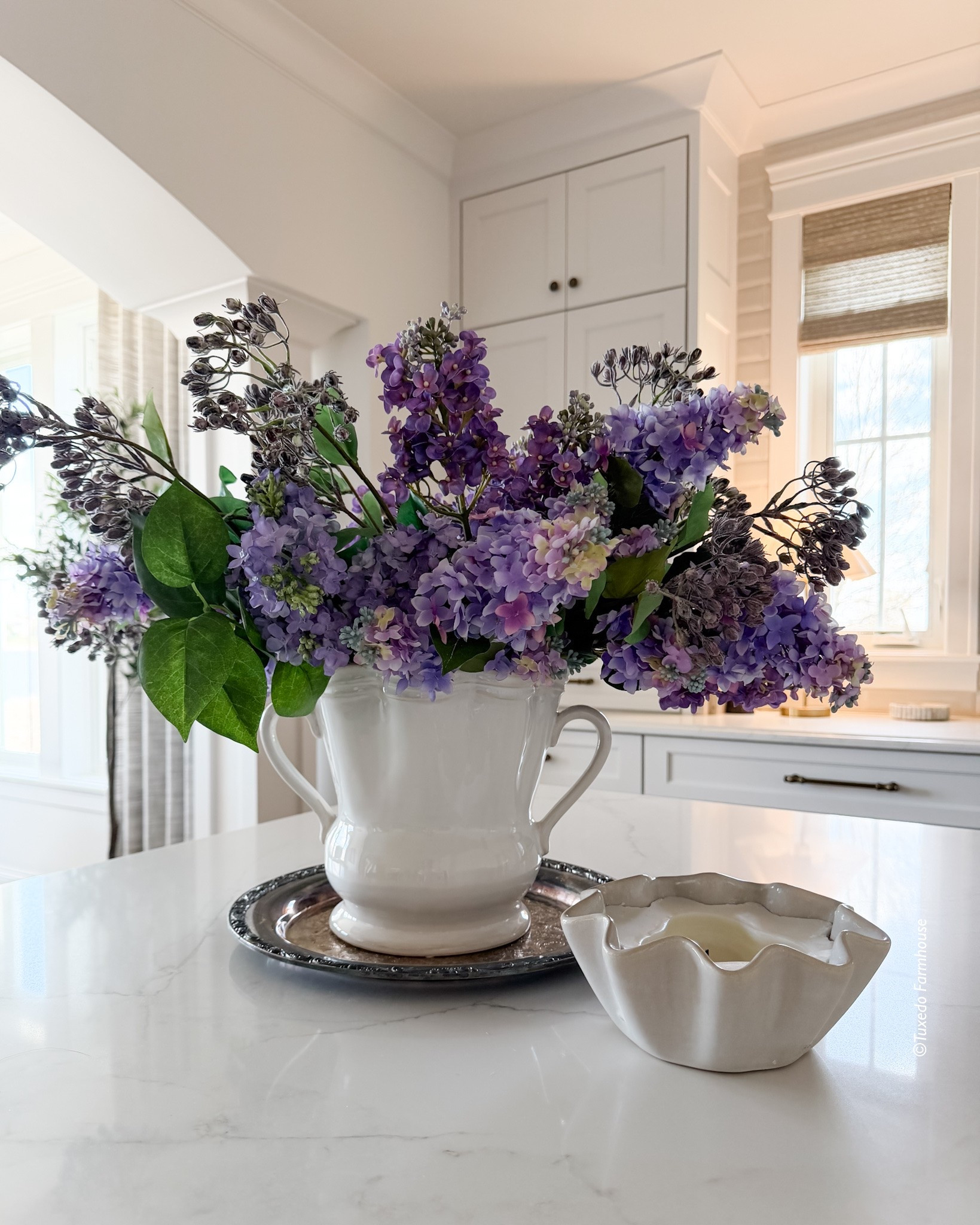 💜 These faux lilacs are one of my favorite spring finds because they actually look realistic.

The soft color variation, delicate blooms, and natural-looking stems make them easy to mix into arrangements without that overly fake appearance. I love styling a few stems in a simple ceramic vase on a coffee table, kitchen island, entry table, or dining centerpiece for an instant touch of spring.

The best part? They stay beautiful all season long with zero maintenance and can be reused year after year.

#LTKSeasonal #LTKHome #LTKSaleAlert