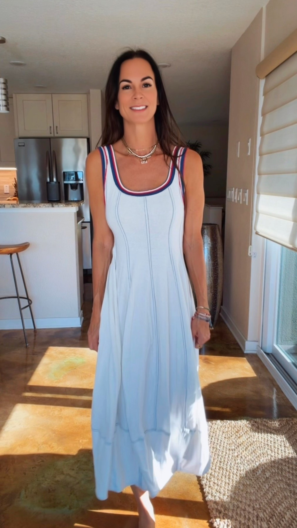This dress had me at the back. 🤍❤️💙

From the front it’s effortlessly chic… but turn around and THAT open racerback is the moment. 😍

And can we talk about this silhouette? The subtle barrel-style hem gives it such a cool, modern shape while still being ridiculously comfortable. It’s one of those dresses you can throw on with sneakers, sandals, or even a denim jacket and instantly look put together.

✔️ Lightweight
✔️ Easy to wear
✔️ Flattering fit
✔️ The cutest sporty trim
✔️ And a back that deserves its own round of applause 👏

This is exactly the kind of dress I’ll be reaching for all summer long—from brunch to beach towns to running around on vacation.

#NicoleColeeStyle #SummerStyle #EverydayChic #VacationStyle #OOTD

#LTKdayinmylife #LTKgrwm #LTKootd