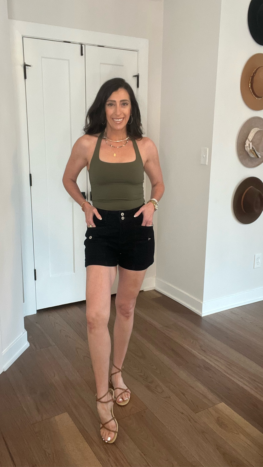 Adorable black and I’m shorts with my favorite new halter tank top with built-in bra! The shorts are the perfect length. Mom approved! 

￼

#LTKootd #LTKOver40 #LTKmomlife
