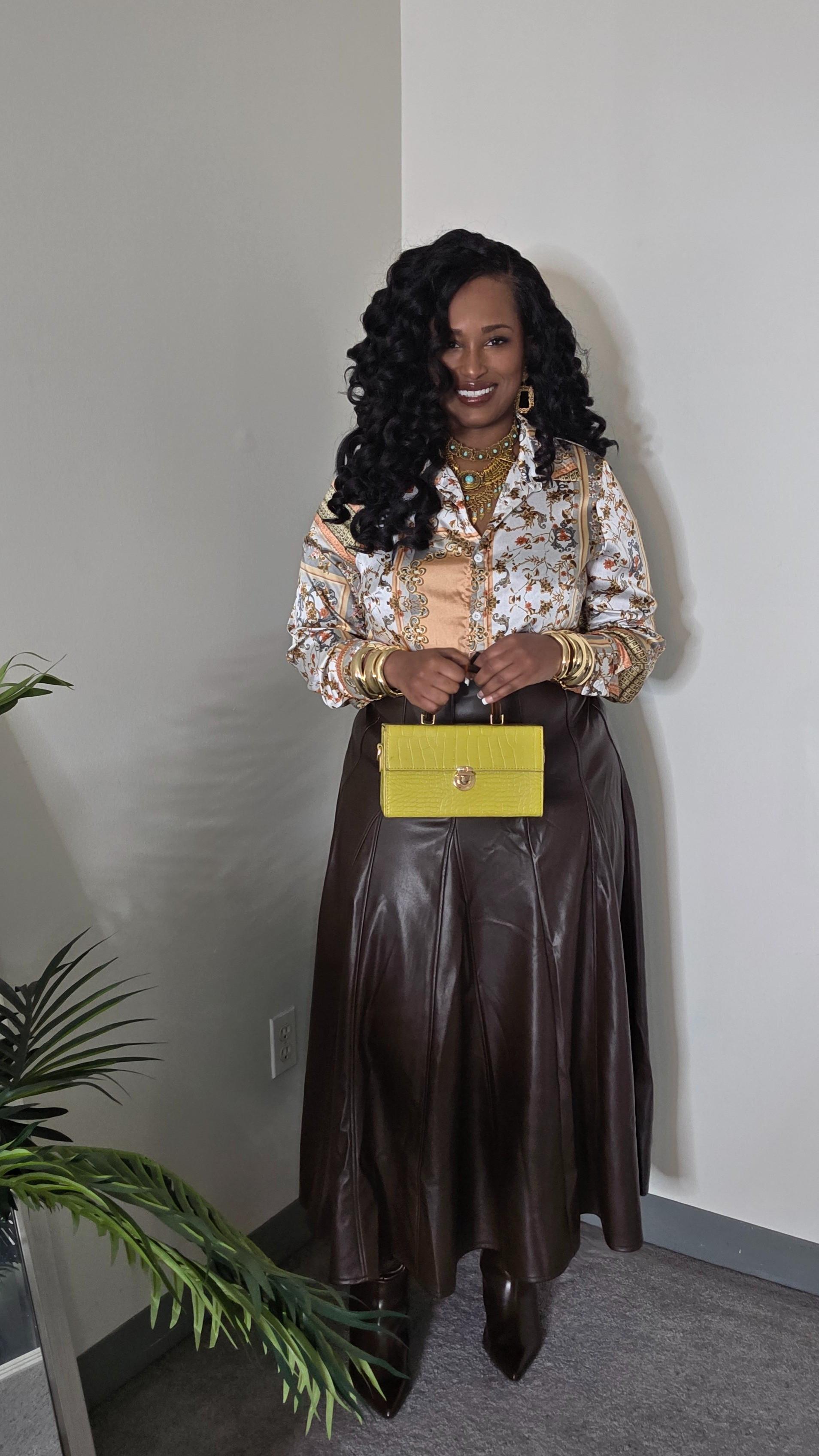 I put this look together with a mix of affordable finds, and everything came together perfectly. The faux leather midi skirt from JCPenney has a gorgeous flow and rich color that gives the whole outfit a luxe feel. I paired it with a printed blouse from SHEIN that added the right pop of detail and elegance. My boots from Lane Bryant were not only stylish but super comfortable—definitely made for all-day wear. I finished the look with layered gold jewelry from Amazon, which pulled everything together effortlessly.Stylish, budget-friendly, and put together with personality—this fit did not disappoint! 💛✨

#LTKootd #LTKCyberWeek #LTKPlusSize