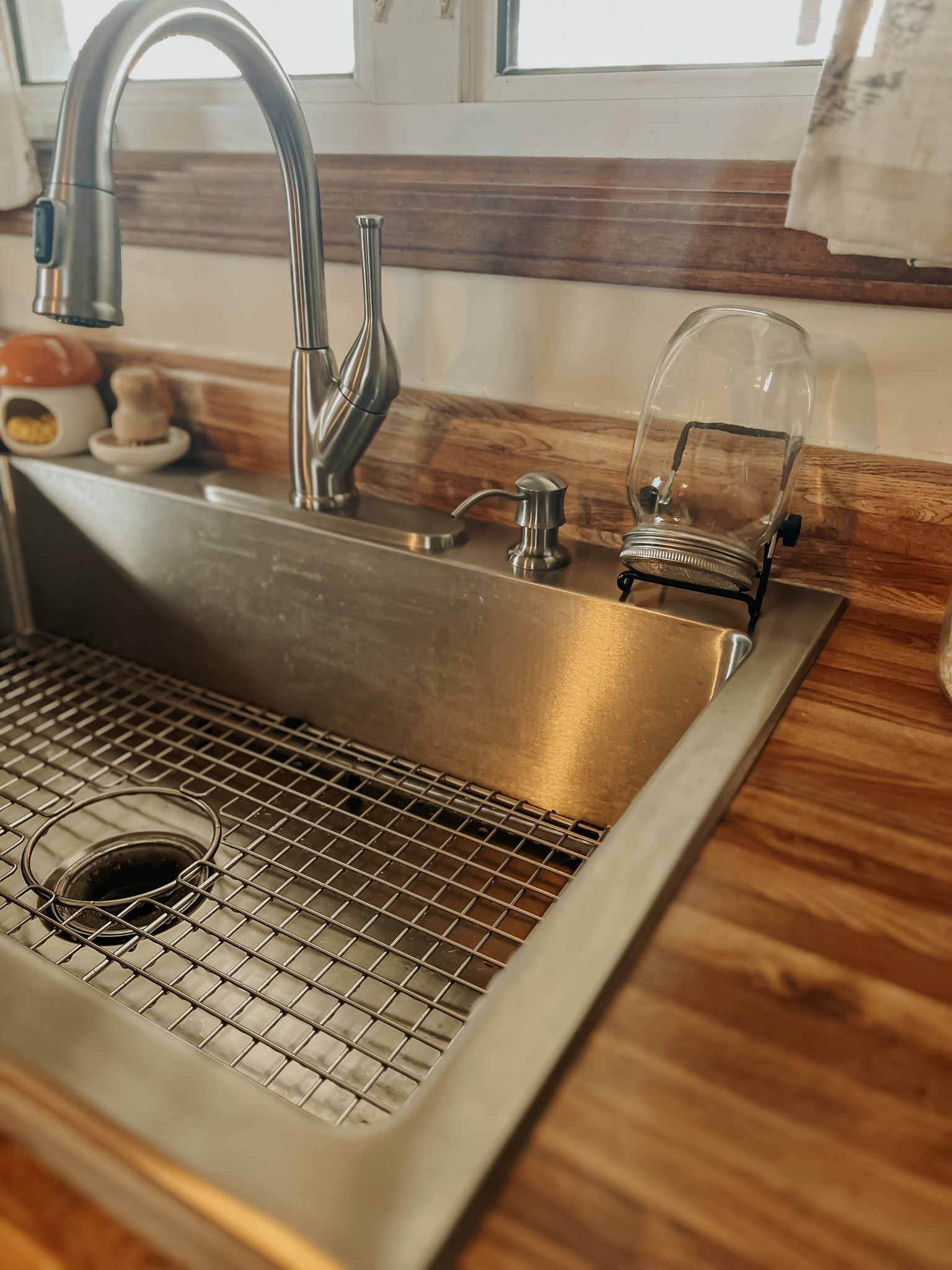 @lowes sink upgrade! love the single bowl with no divider. makes washing large pots and my canner much easier. plus this sink grid is a must! It prevents the bottom of your sink from being scratched and is really easy to clean. 

#LTKmomlife #LTKSaleAlert #LTKHome