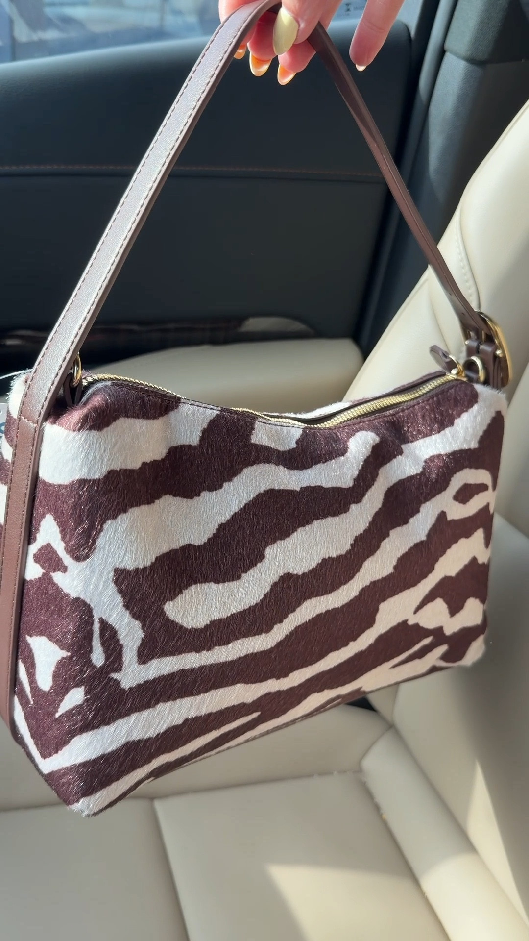 Zebra bag on sale! Old navy purse, animal print, white, brown.

#LTKSaleAlert #LTKWorkwear #LTKTravel