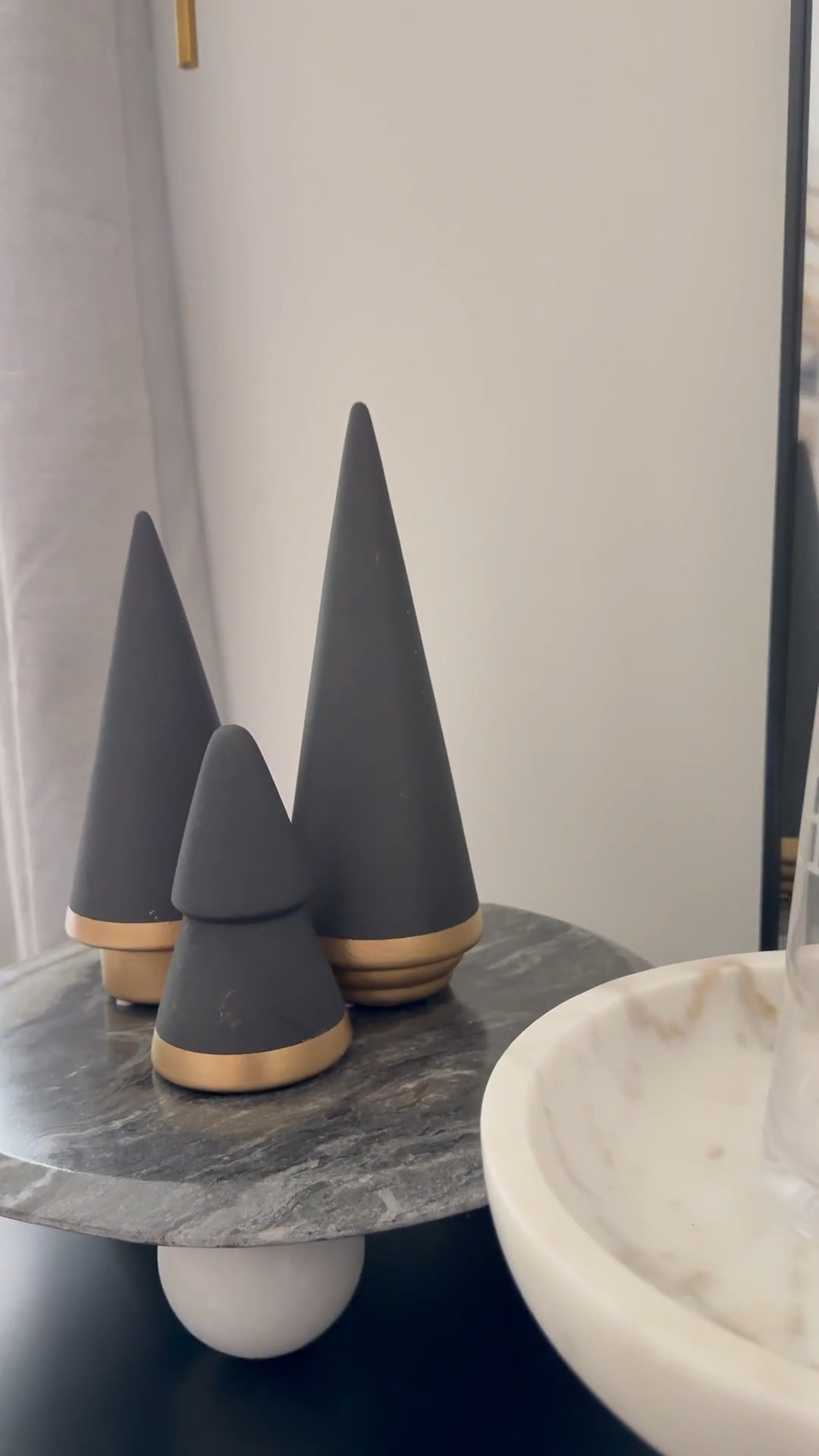 Black + brass + beautifully modern. These ceramic trees bring quiet luxury to your holiday styling — a little moody, a lot of luxe. ✨

#LTKHoliday #HouseofCovington #MoodyChristmas


#LTKHome #LTKHome #LTKFindsUnder50 #LTKSeasonal