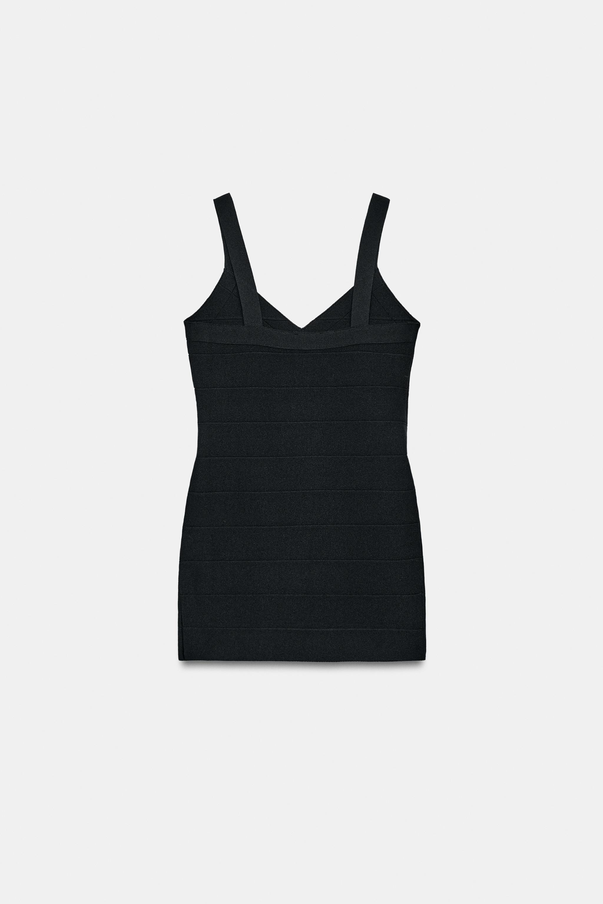 Model height: 178 cmMini dress made of stretch fabric. Featuring a V-neck and straps. | Zara UK