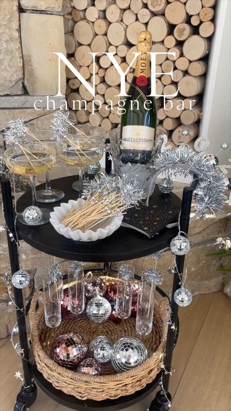 NYE \ Staying home? Make it festive!🍾Setup a mini champagne bar to ring in the new year and she’s cuuuuute🍾🪩🥂 SO many great Amazon finds: coupe glasses, disco ball lights, 2024 headband and more! Cheers to ringing in the new year at HOME☺️🥂 



#LTKVideo #LTKHoliday #LTKparties