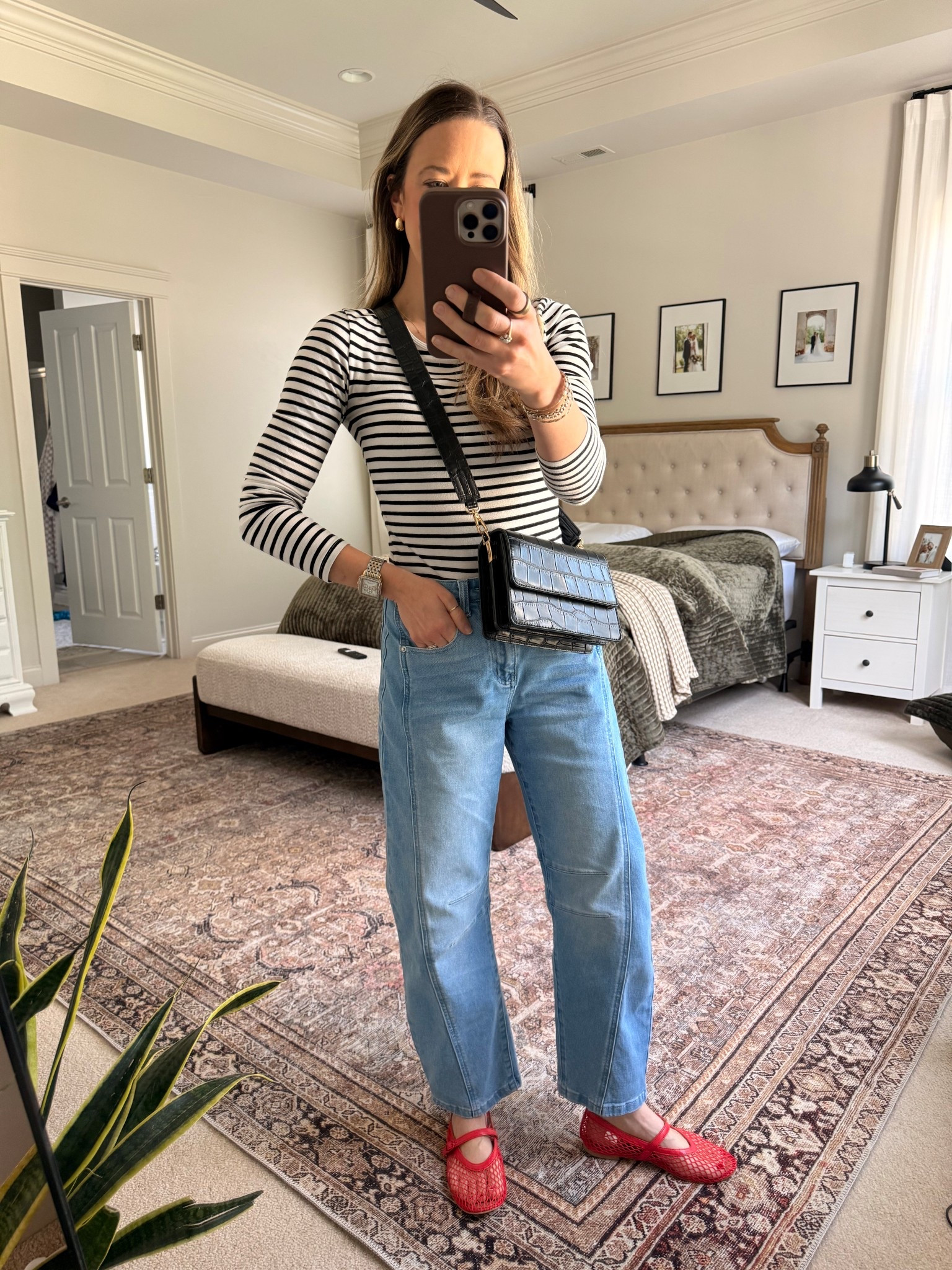 Classic Striped Tee + Amazon Jeans Outfit ❤️

• Black & white striped long sleeve
• Amazon high rise straight leg jeans
• Red Mary Jane flats
• Amazon black crossbody bag

This is one of my favorite easy outfit formulas: striped top + straight leg jeans + statement flats.

The striped long sleeve tee keeps it timeless. The red flats add personality. The structured crossbody instantly elevates the whole look.

Perfect for:
• Casual chic mom outfits
• Straight leg jeans outfit
• Amazon jeans find
• Spring outfit ideas for moms
• Classic French-inspired style
• Everyday capsule wardrobe
• School drop-off outfit

These Amazon jeans are such a good budget-friendly option if you love the high-rise, barrel fit.

#LTKgrwm #LTKootd #LTKmomlife