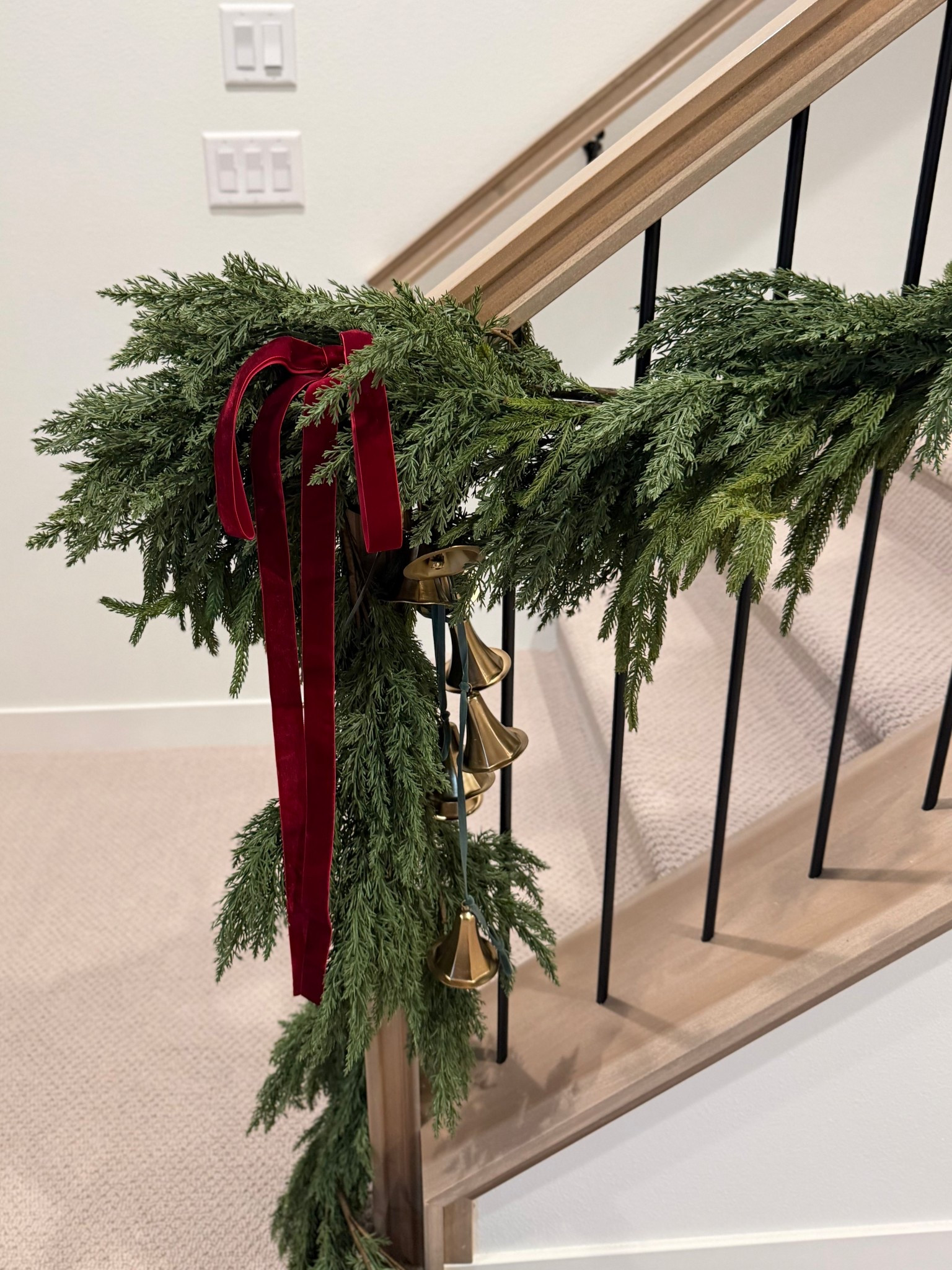 Garland I used on our basement stairs. I used five pieces total and wrapped two pieces around each other. 

#LTKHoliday #LTKHome #LTKSaleAlert