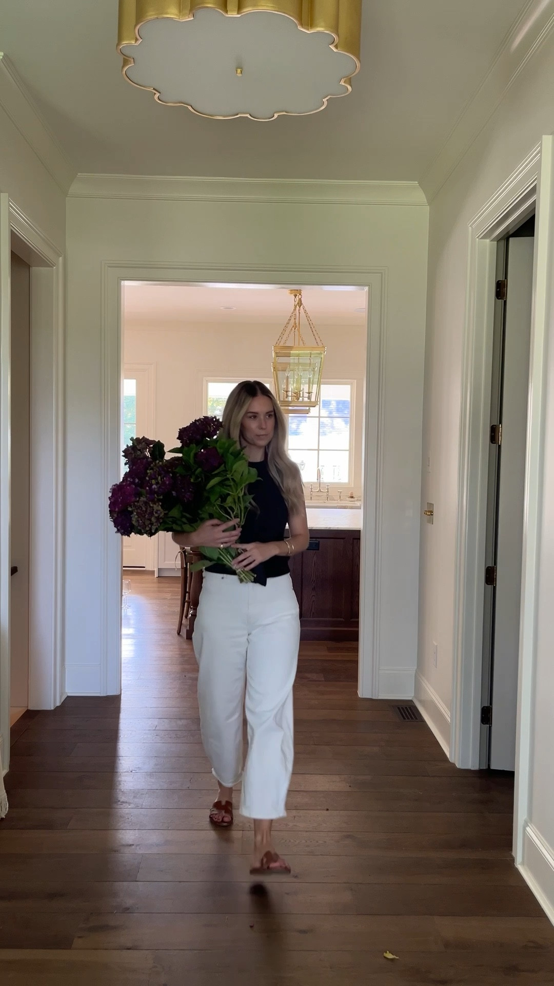 My go to early fall outfit when it is still hot out but I want the fall vibes 
My favorite everlane jeans and new shoulder wrap sweater tank 

#LTKSeasonal