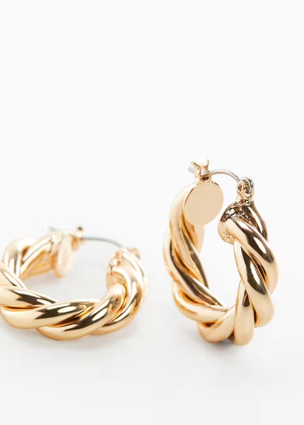 Intertwined hoop earrings -  Women | Mango USA | MANGO (US)