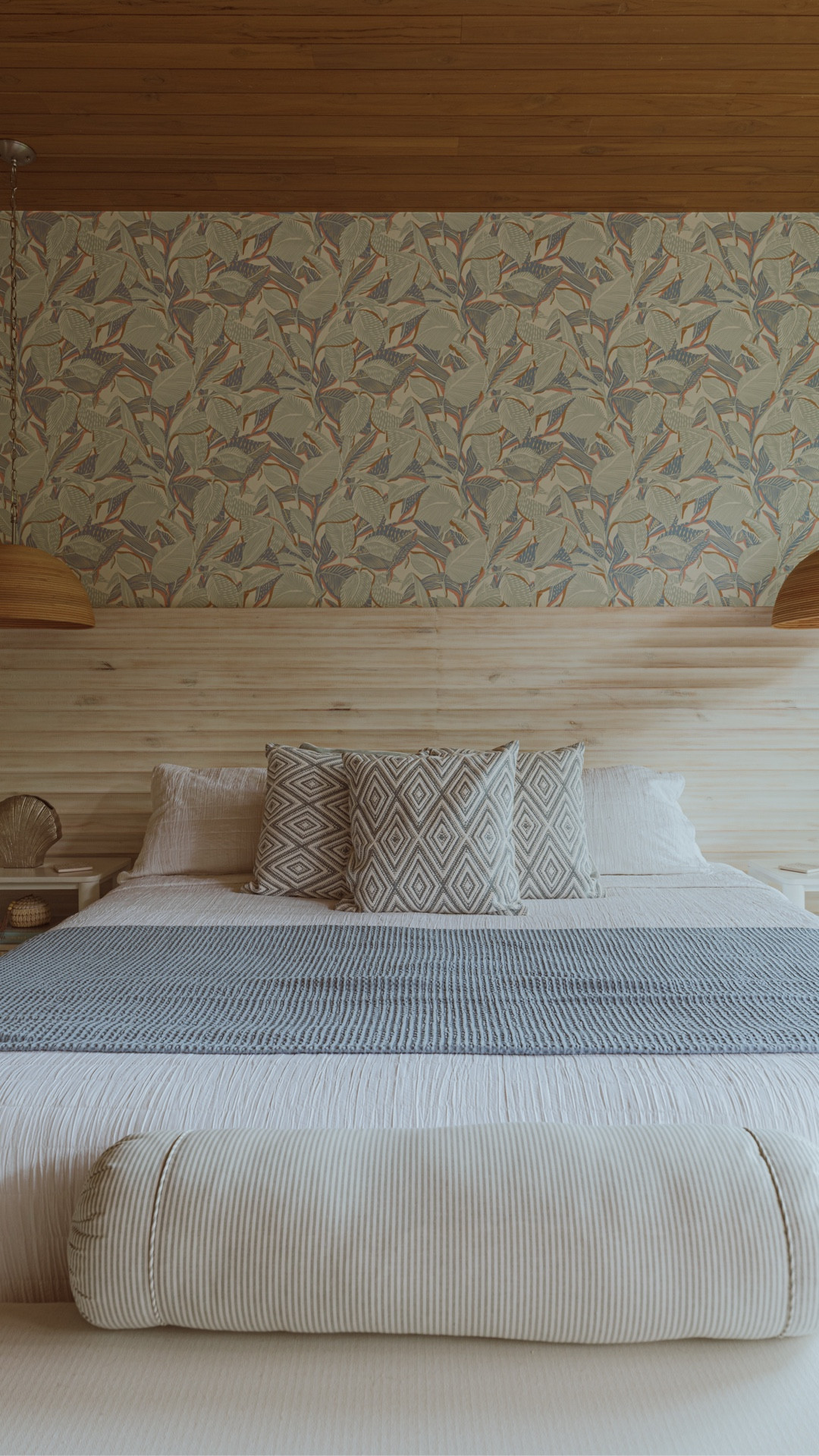 In the downstairs king bedroom at Villa Nya, the details do the talking. 🌴 The allen + roth pendants, Riviera wallpaper by Casadeco, and our TOV Patty rattan dresser all layer together for that breezy, beach-house feel. 🌊

#LTKdayinmylife #LTKHome #LTKselfcare