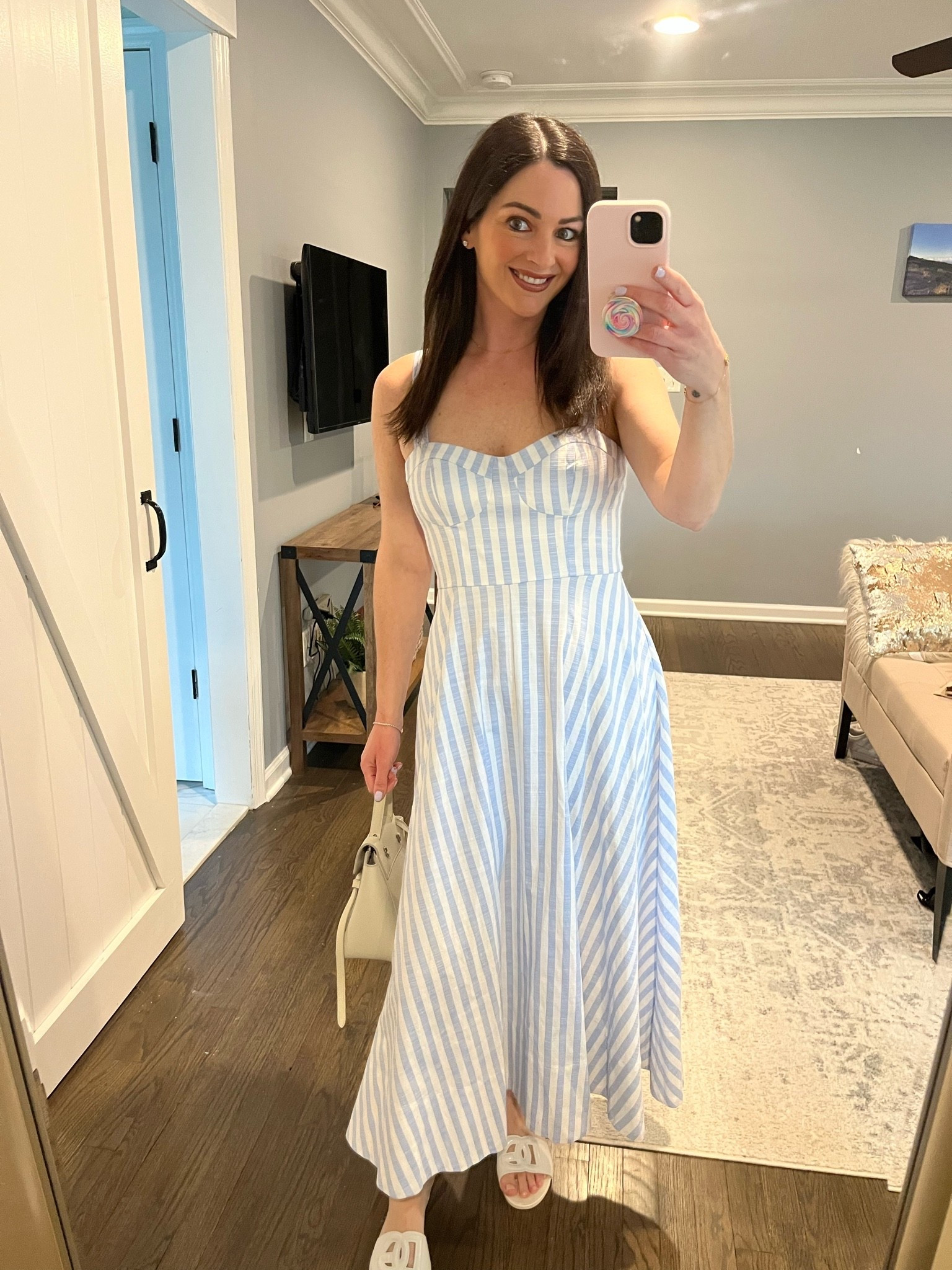 The summer dress I know I’ll be reaching for on repeat ☀️🤍 This blue and white striped midi dress is one of those effortless pieces that makes getting dressed so easy. The built-in bra cups mean no extra layers or uncomfortable strapless bras — just throw it on and go 👏



I’m obsessed with the flattering midi length because it works with everything from sneakers and sandals to heels, making it perfect for brunch, vacations, baby showers, summer parties, date nights, and basically every warm-weather occasion on my calendar. The fit is so comfortable, the stripes feel timeless, and it instantly looks put together with minimal effort ✨



If you’re looking for an easy summer outfit idea that’s comfy, versatile, and chic… this dress is it. I’m wearing a size Small


@ASTR the Label 
#SummerDress #MidiDress #SummerStyle #DressSeason #VacationStyle

#LTKWorkwear #LTKTravel #LTKWedding