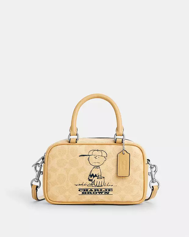 Coach X Peanuts Satchel Crossbody Bag In Signature Canvas With Charlie Brown | Coach Outlet US