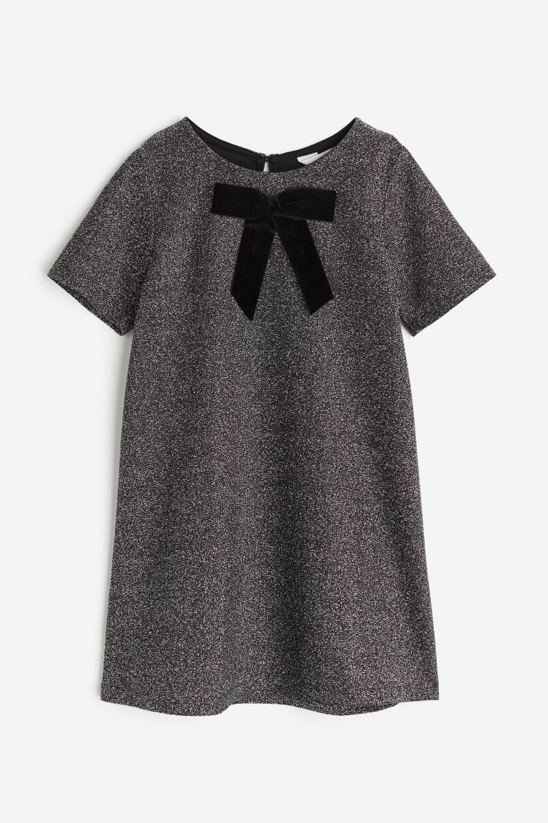 Robe scintillante avec nœud | H&M (FR, IT, ES, PT, BE)