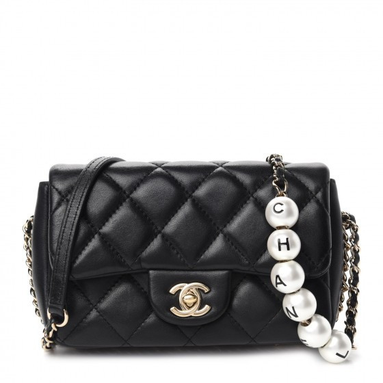 CHANEL

Lambskin Quilted Mini My Precious Flap Black | Fashionphile