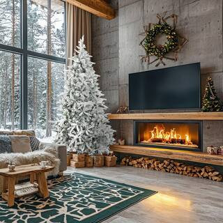 7.5-ft. Pre-Lit Mountain Pine Snow Flocked Artificial Christmas Tree, Warm White LED Lights | The Home Depot