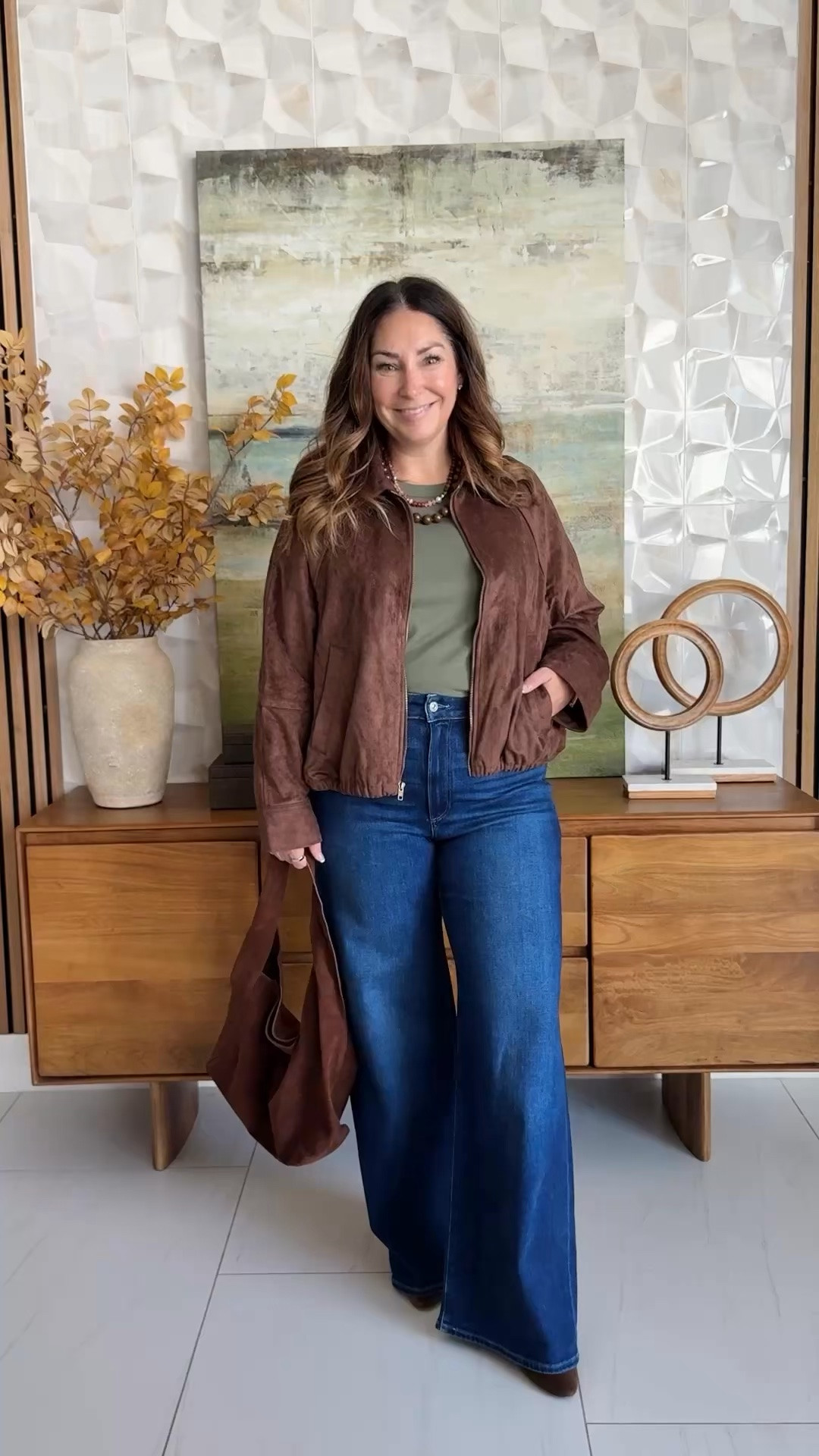 Okay THIS outfit feels like fall. 🤎🍂 IThis Old Navy suede jacket is the star.  love all the rich brown and olive paired with wide-leg jeans, and that slouchy bag pulls the whole thing together! 🔗👇
Wearing Jacket tts, L | Tee tts, L | Paige tts, 31

#LTKOver40 #LTKMidsize #LTKTall