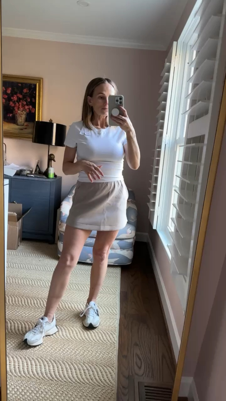 This white cropped tee is a great spring/summer must-have. I love a cropped tee for leggings or high waisted shorts or this skirt. It’s nice to not have to bunch up the fabric like I would with a longer top. Size Medium in the top, XS in the skirt. 

#LTKSeasonal #LTKstyletip
